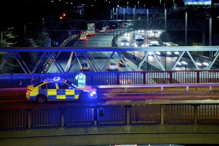 Patrol-Traffic-bridge-at-night.jpg