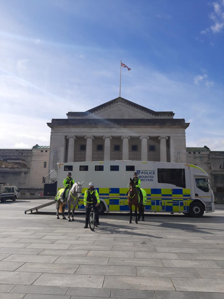 county-lines-intensification-week-2022-in-southampton.-l-r-harper-and-loki-with-their-riders-from-the-mounted-section-with-an-officer-on-bike-patrol-in-between..jpg