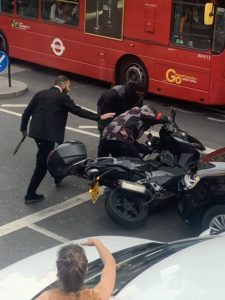 Terrifying moment passengers aboard a London bus witness violent attack on motorcyclist