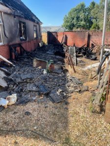 Bonfire spreads to garage roof in Pennington