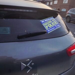 Driver stopped after overtaking marked police car on hatchings without insurance